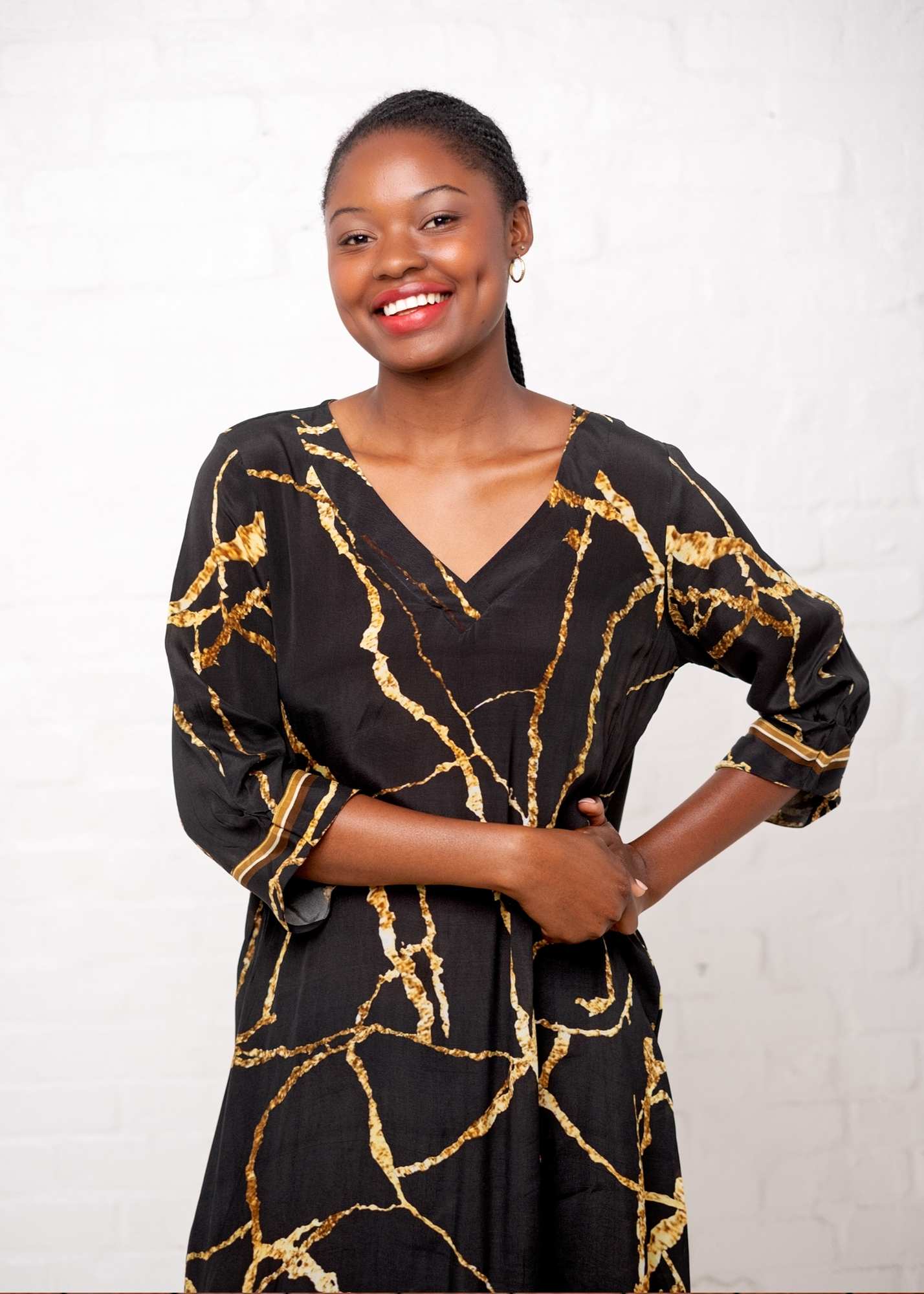 Gloria Dress with Tucked Sleeve Detail in Black and Gold Marble