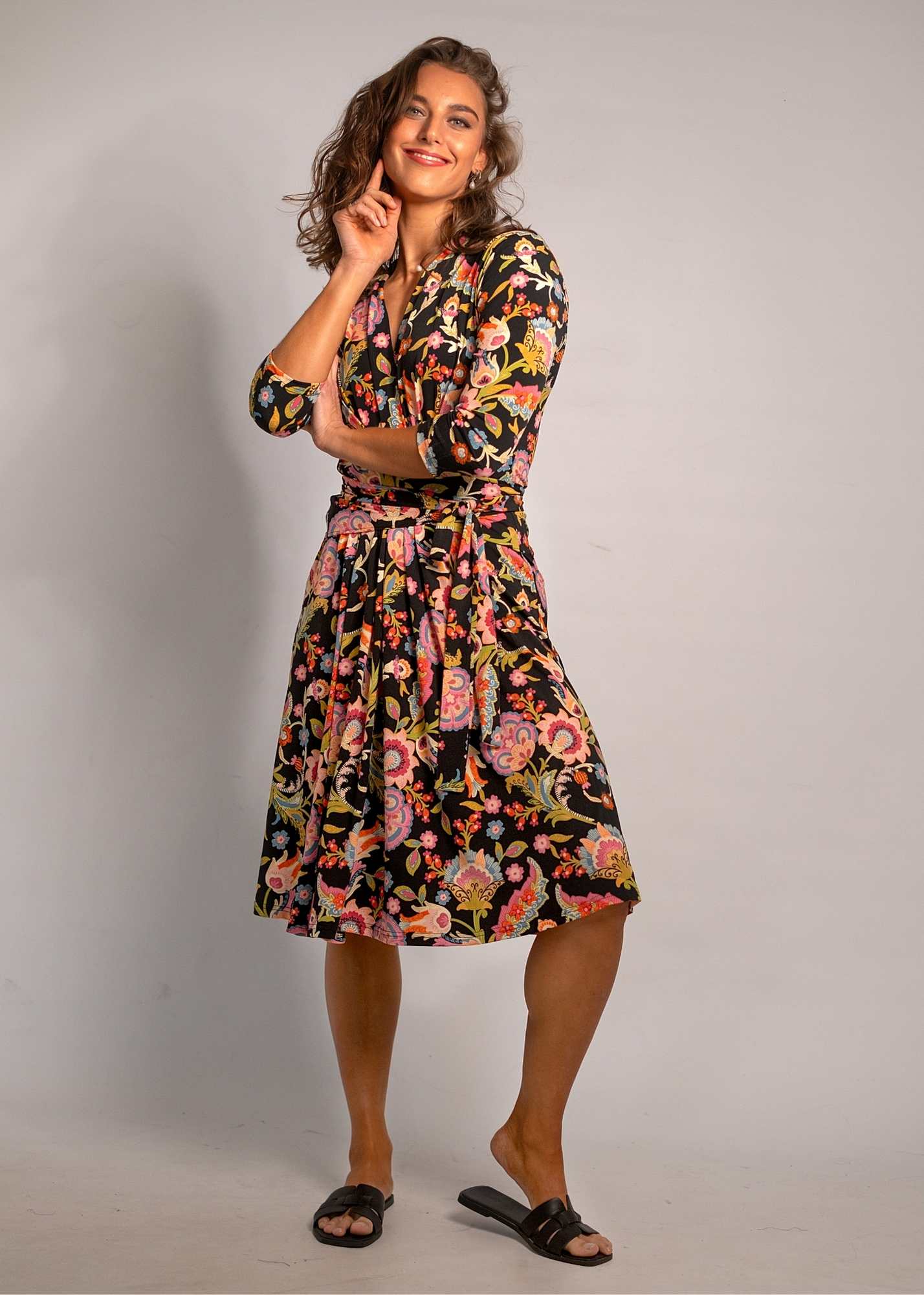 Inge Wrap dress - knee length in Black and Coral Flowers