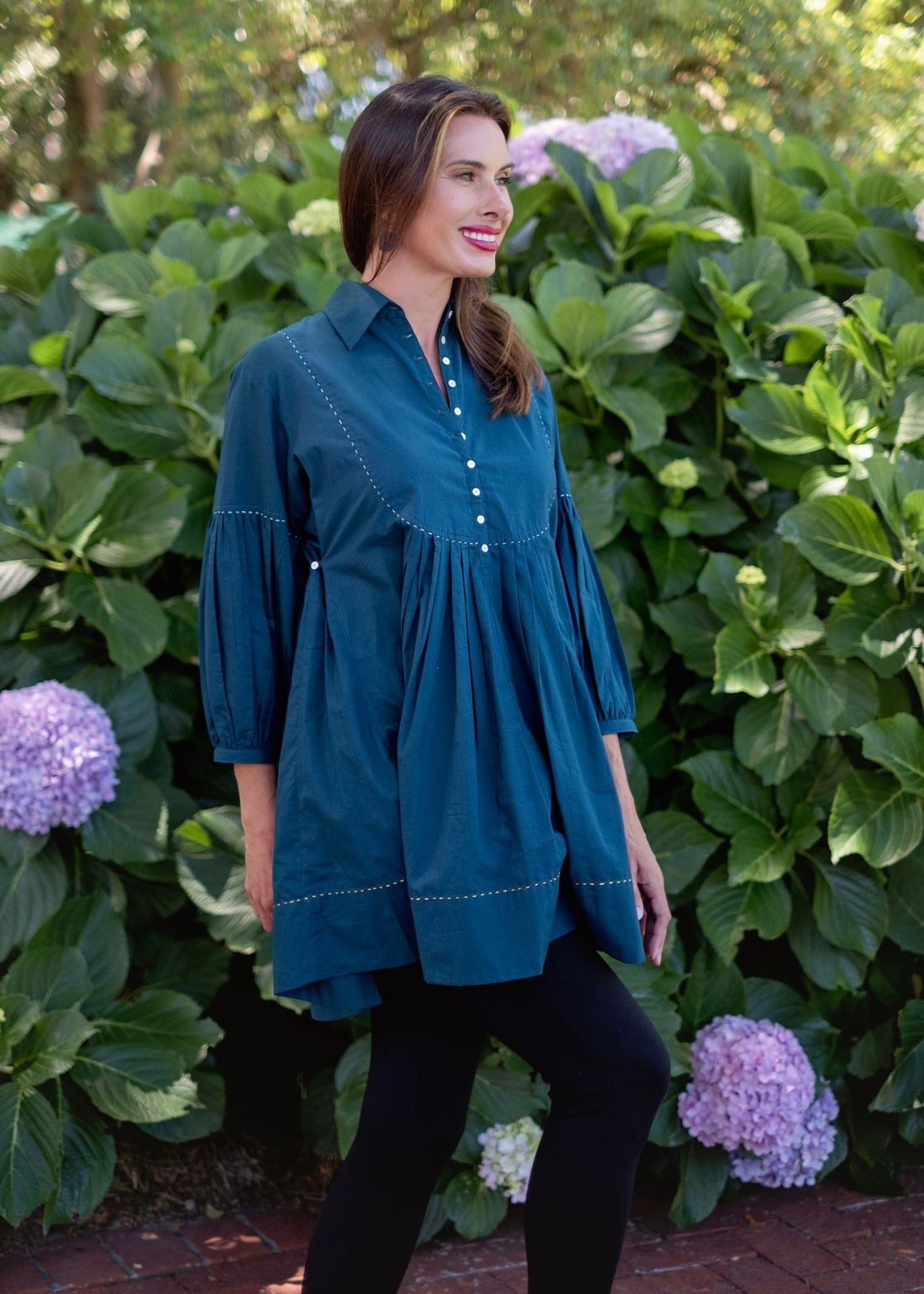 Pleated tunic with saddle stitching, Teale