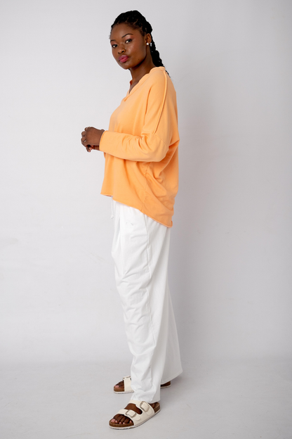 The Super Slouch V-Neck Track Top in Apricot