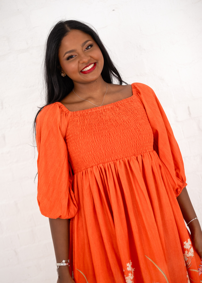 Donna Dress in Terracota.