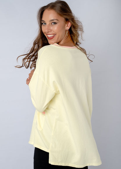 Lagen Top in Soft Yellow with Pink Detail on Trim