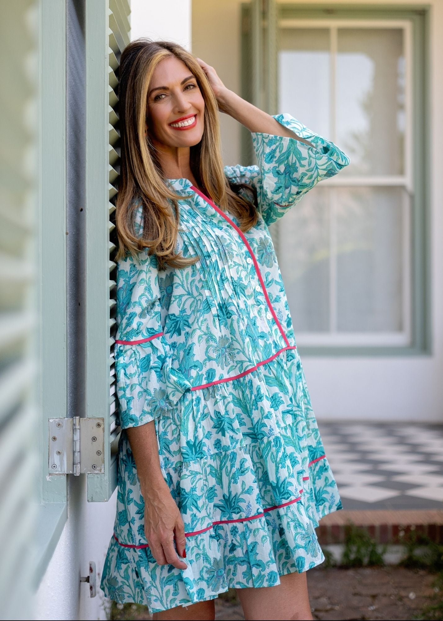 Valentina dress in Jade Leaves with Red Piping Detail