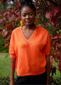 Urban Cozi V-Neck Short Sleeve Knit Top in Orange